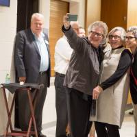 Guests taking a selfie during the event.